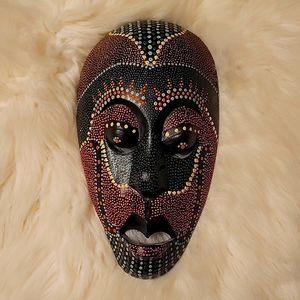 Wooden carved dot art Indonesian mask